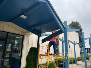 Empire Services crew dismantling the canopy at a tire company in Allentown, PA.