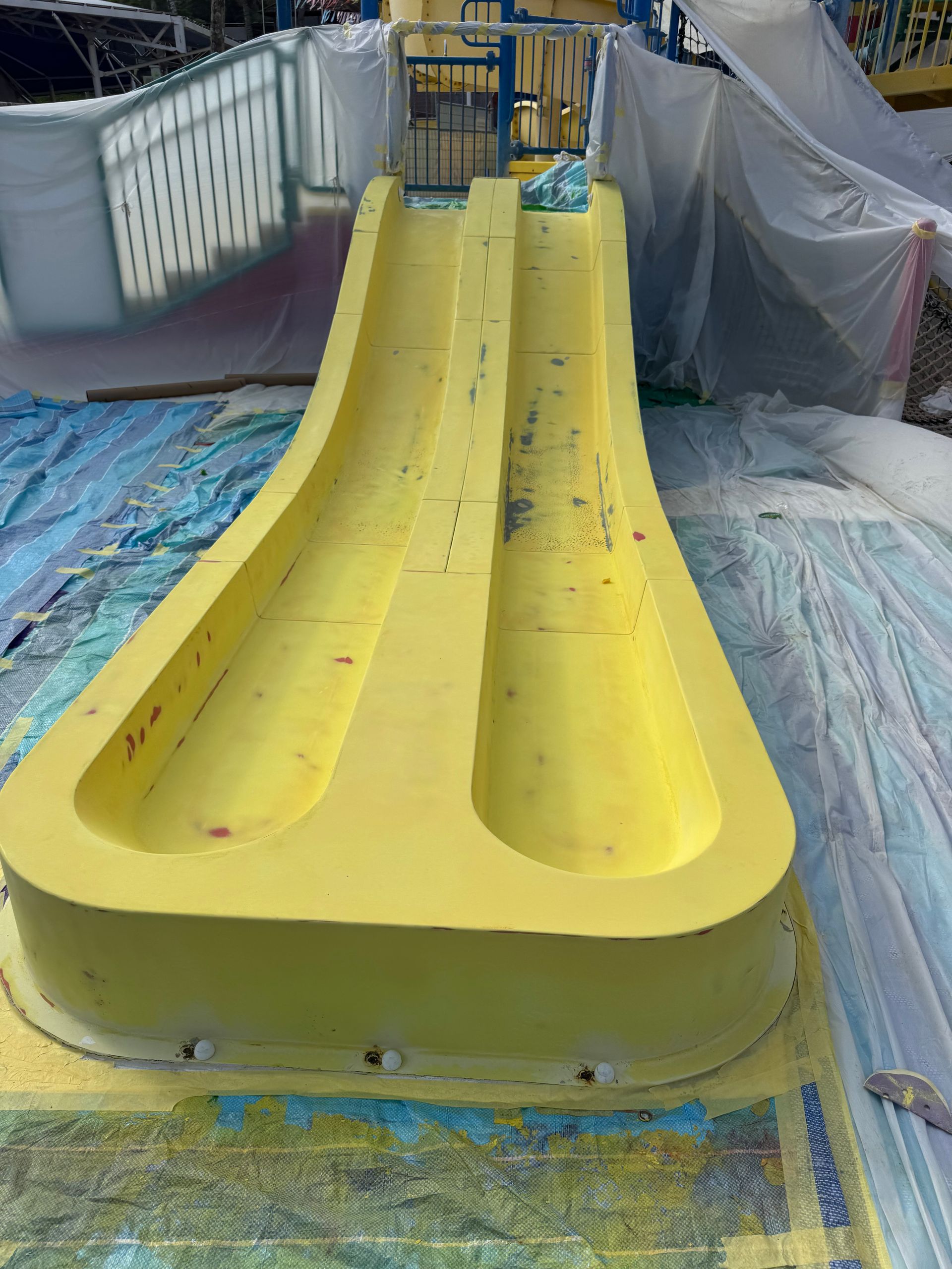Dual-lane waterslide runout section during restoration at Legoland Malaysia