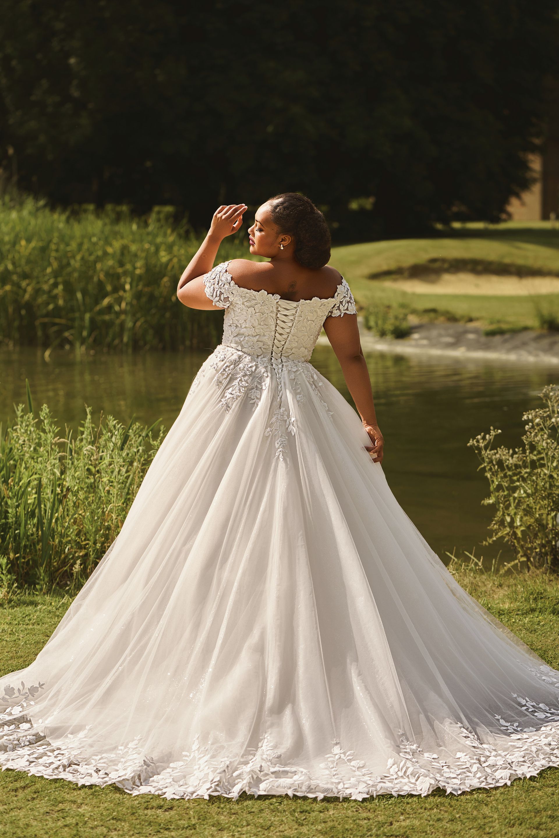 Envy by Phoenix curves wedding dress PH7026