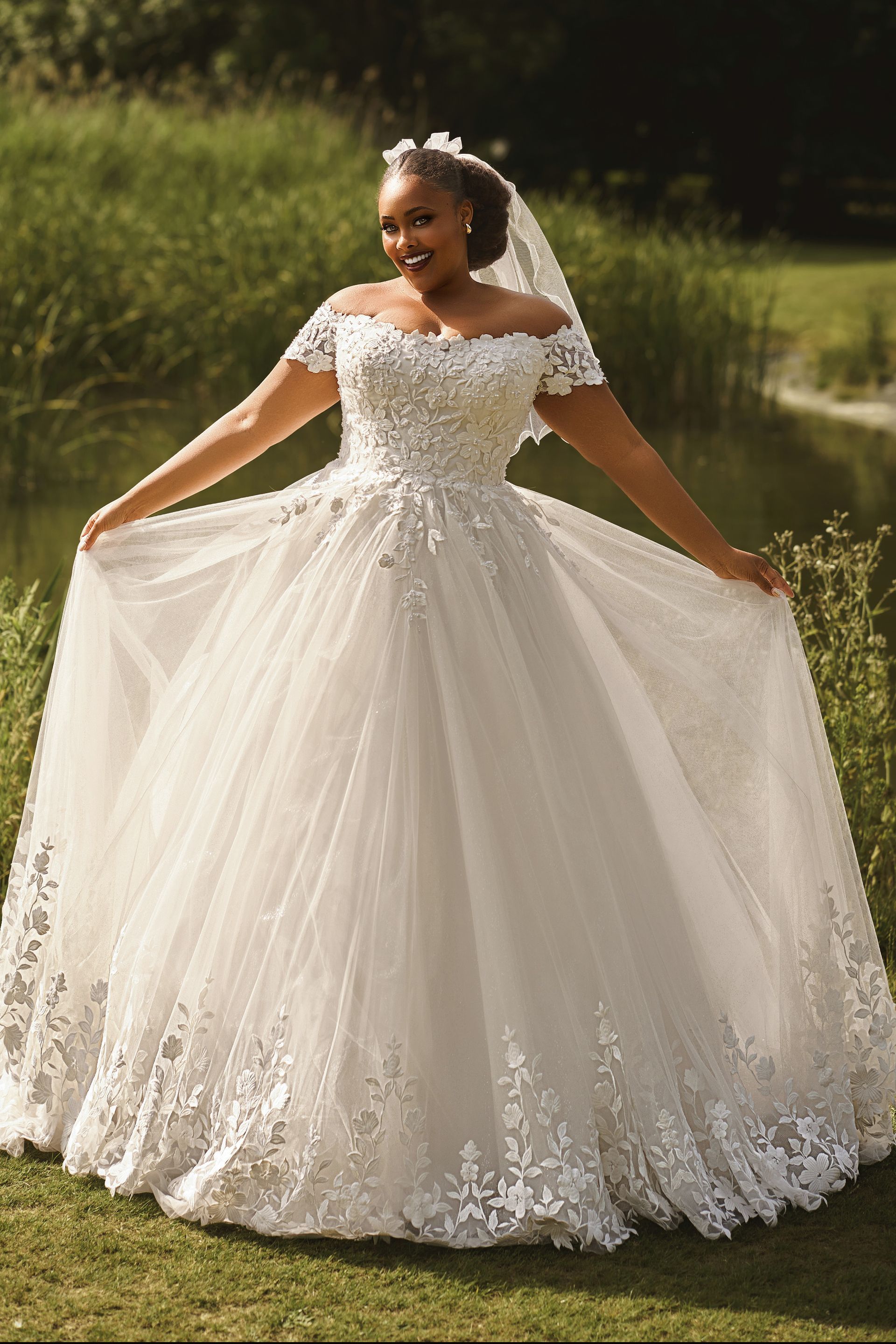 Envy by Phoenix curves wedding dress PH7026