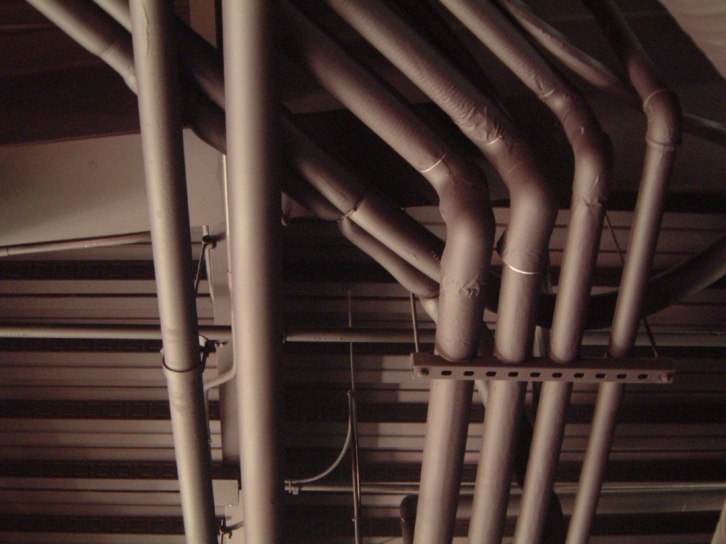 Some Conduit And Plumbing Inside The 5Th Avenue Bar In D Troit 1254239-1920W