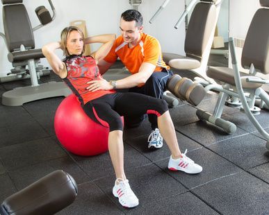 coach instructs woman