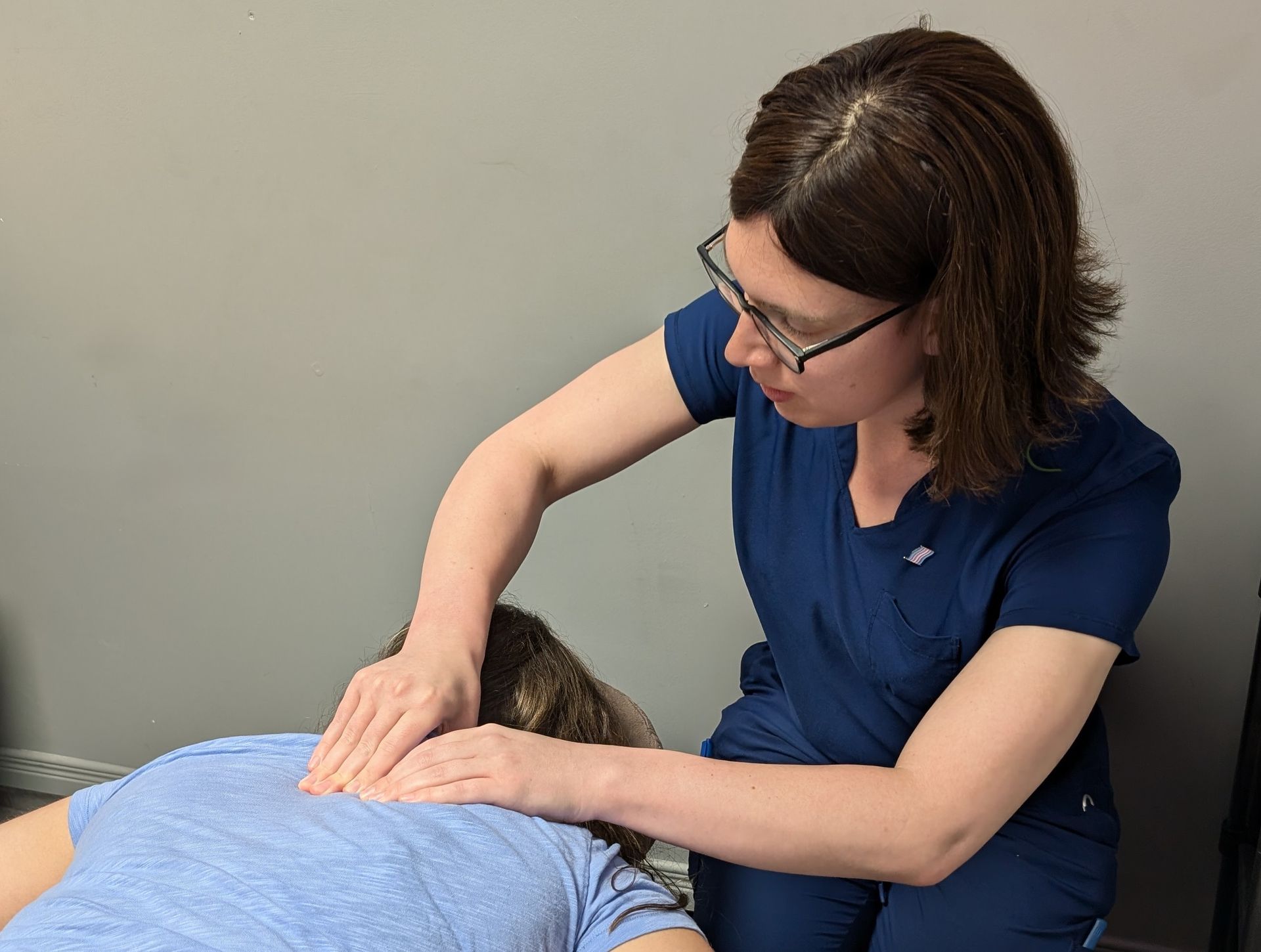 A woman is getting a massage at a spa.