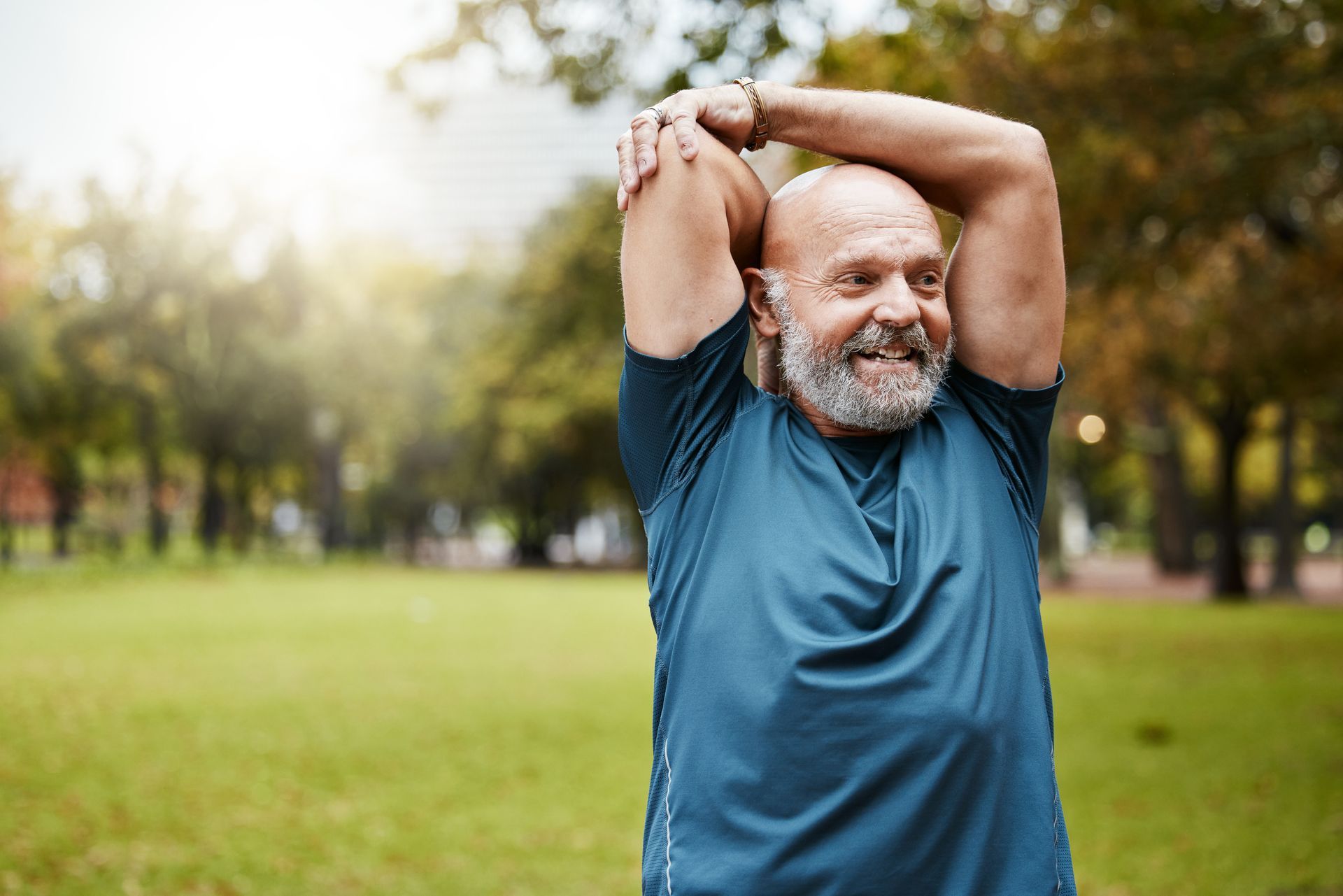 A man is wearing a posture corrector on his back.
