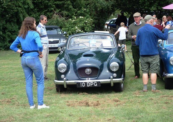Classic car parked at church fete in hampton bishop