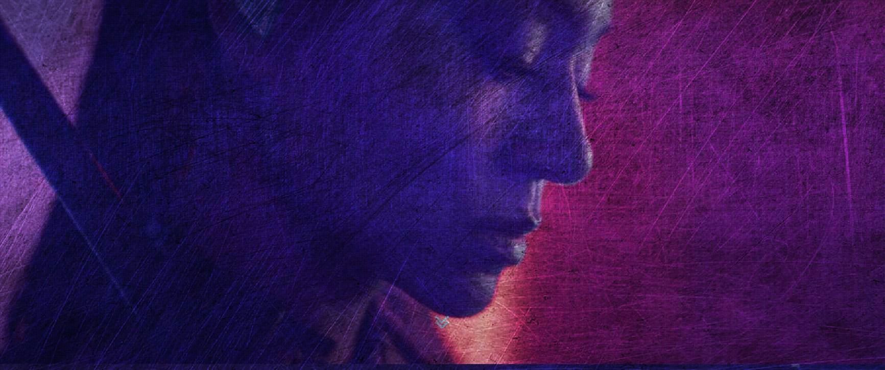 A close up of a person 's face against a purple background.