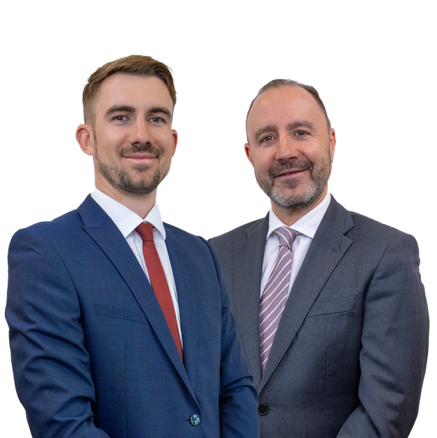 Two men in suits and ties are standing next to each other on a white background.