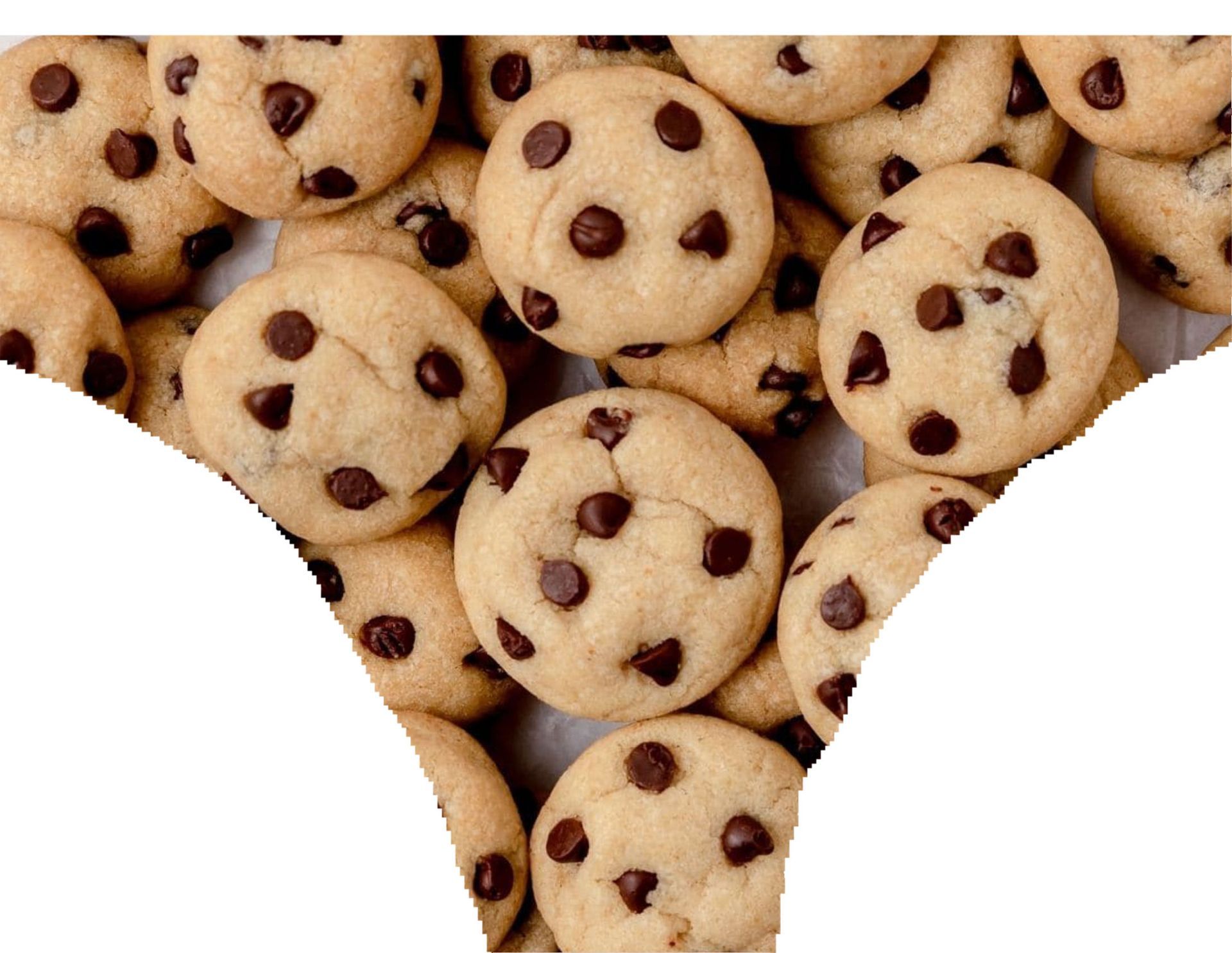 a pile of chocolate chip cookies on a white surface
