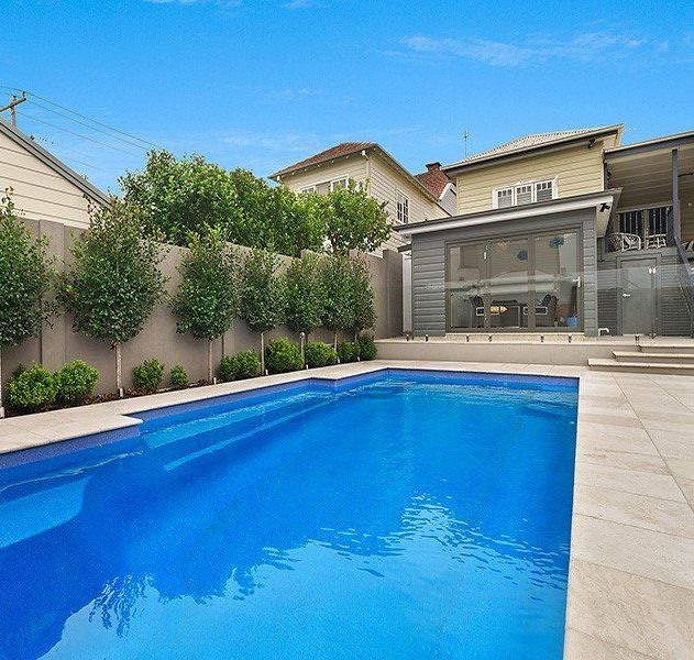 A Pool House Adjacent to a Swimming Pool — Swimming Pool in Lake Macquarie, NSW