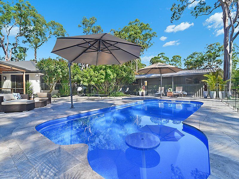 A Swimming Pool With Sun Lounges— Swimming Pool in Scone, NSW