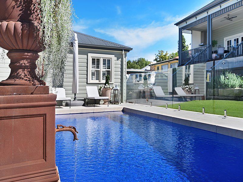 Large Swimming Pool With Plant On The Side — Swimming Pool in Lake Macquarie, NSW