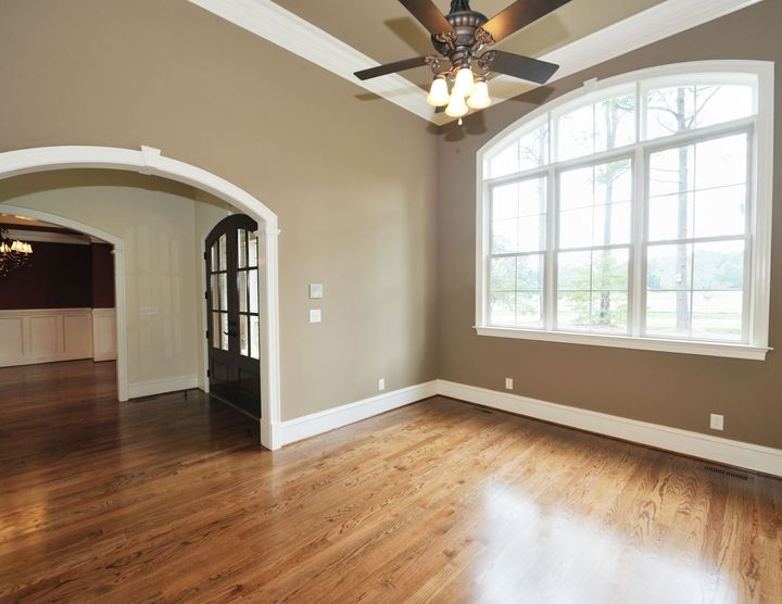 room with natural wood and hardwood floors in st louis