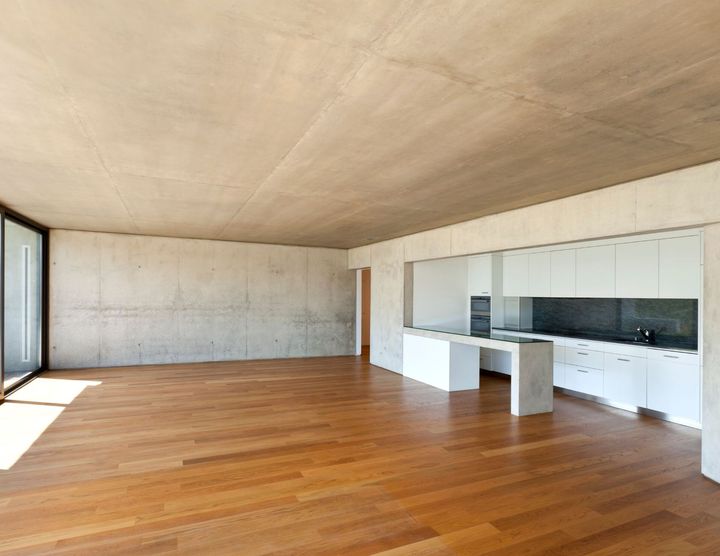 big open room with newly refinished hardwood floor in st louis