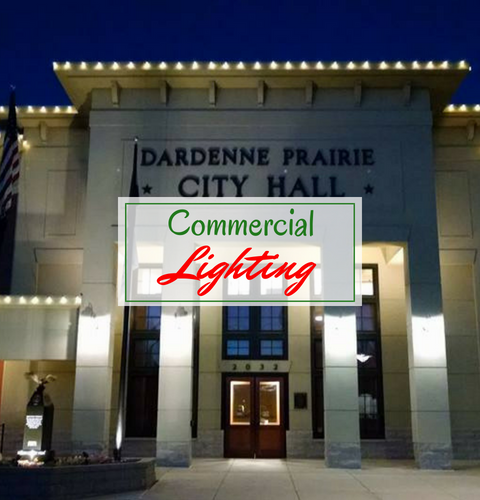 Dardenne Prairie City Hall entrance at night with a Commercial Lighting sign on the facade