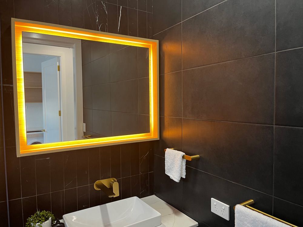 Big Mirrors With Lightings In The Bathroom — Rohr Electrical In Dubbo NSW