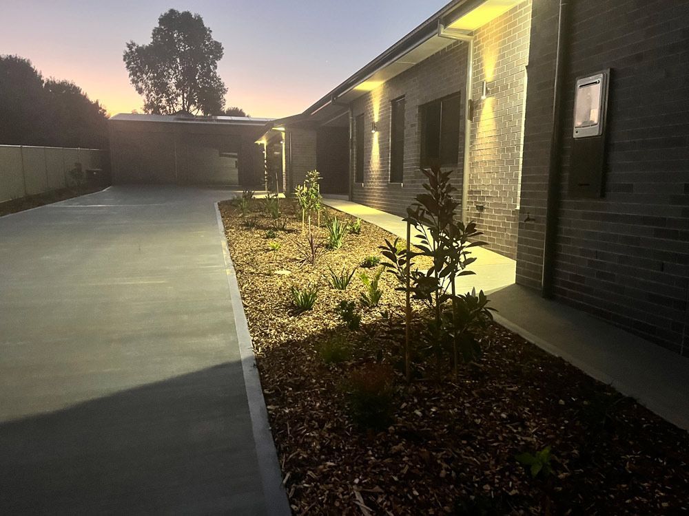 Outdoor Lights On A House At Night — Rohr Electrical In Dubbo NSW