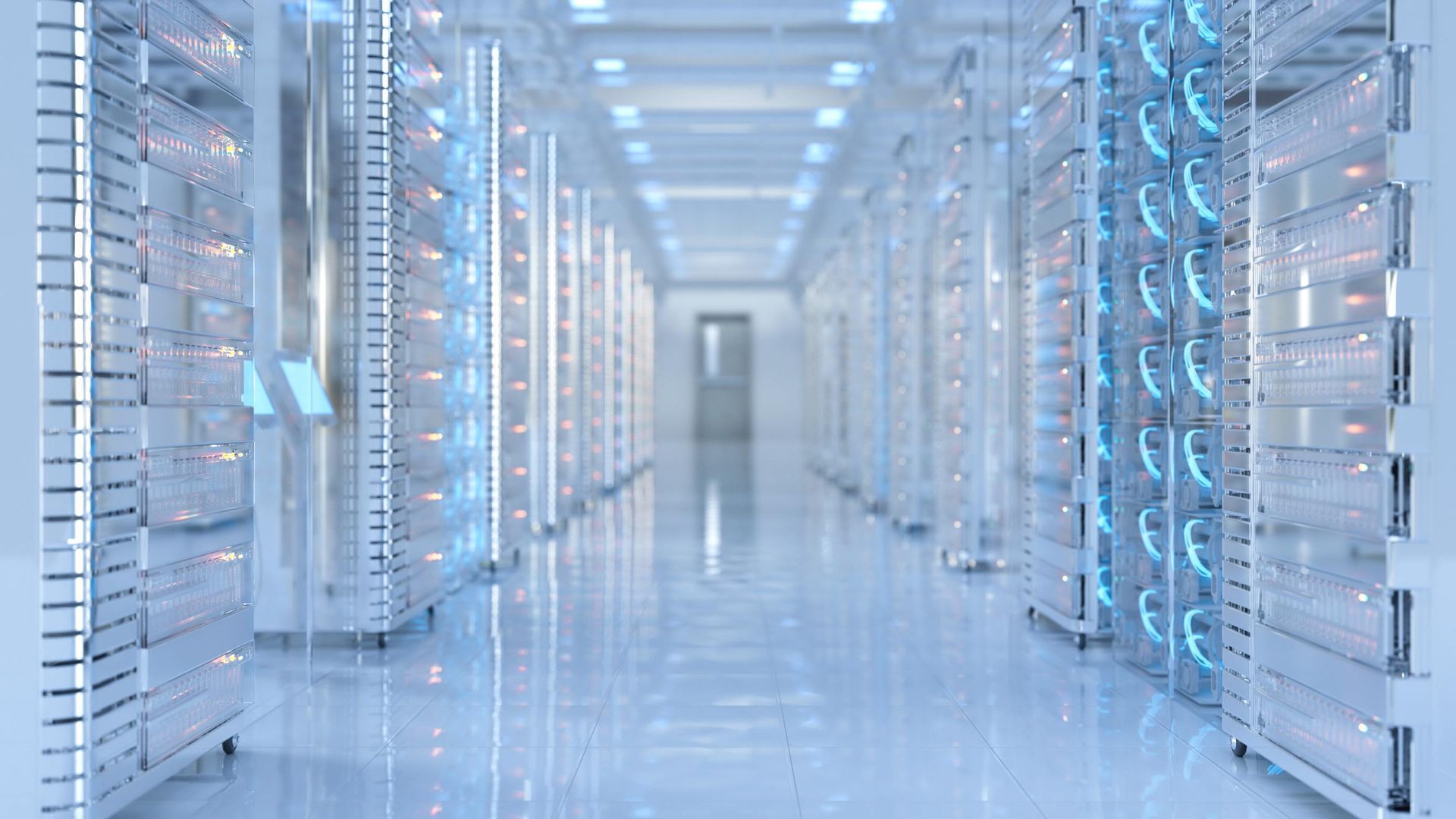 A row of servers are lined up in a server room.