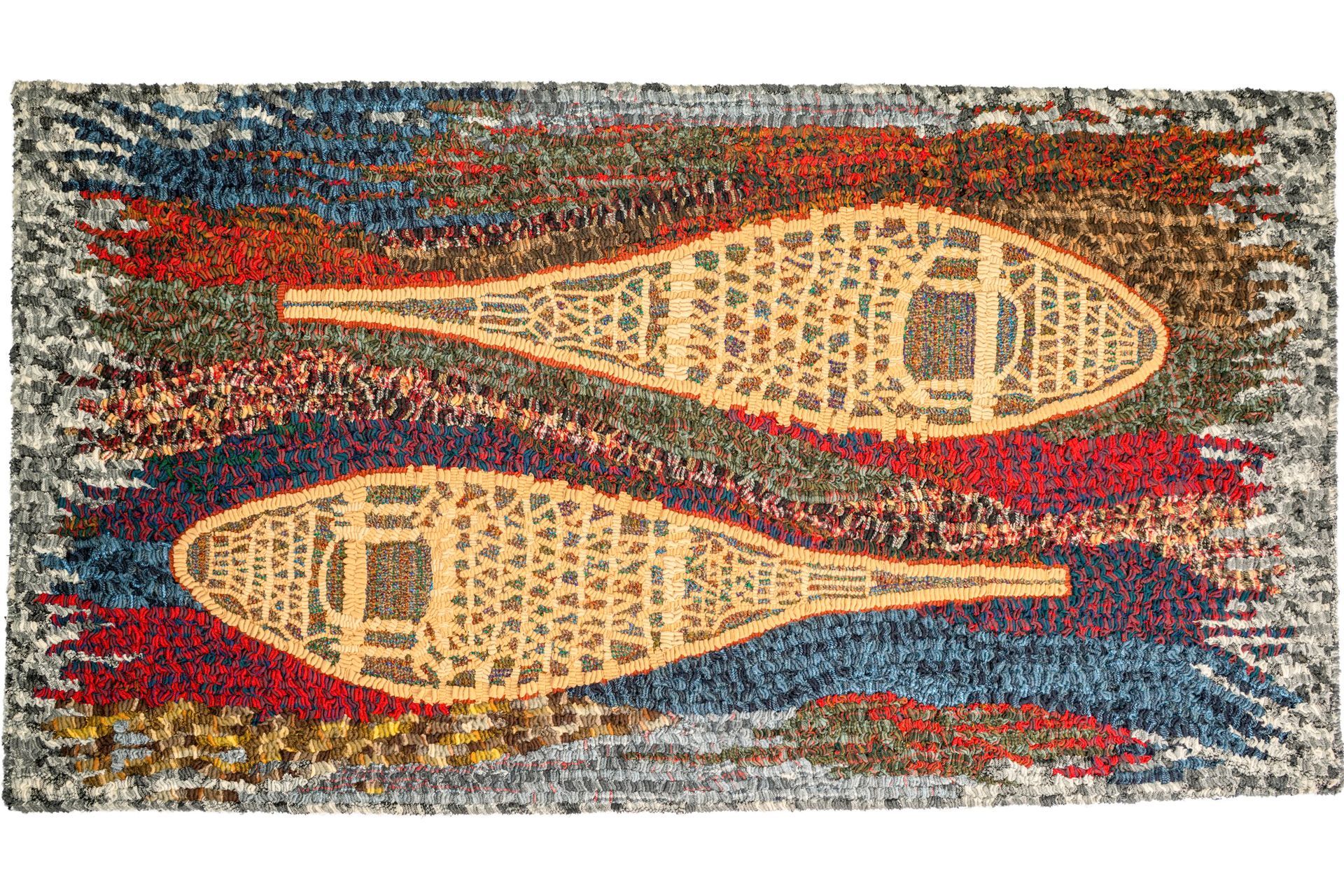 Rug with two tan snowshoe silhouettes on a colorful, textured background.