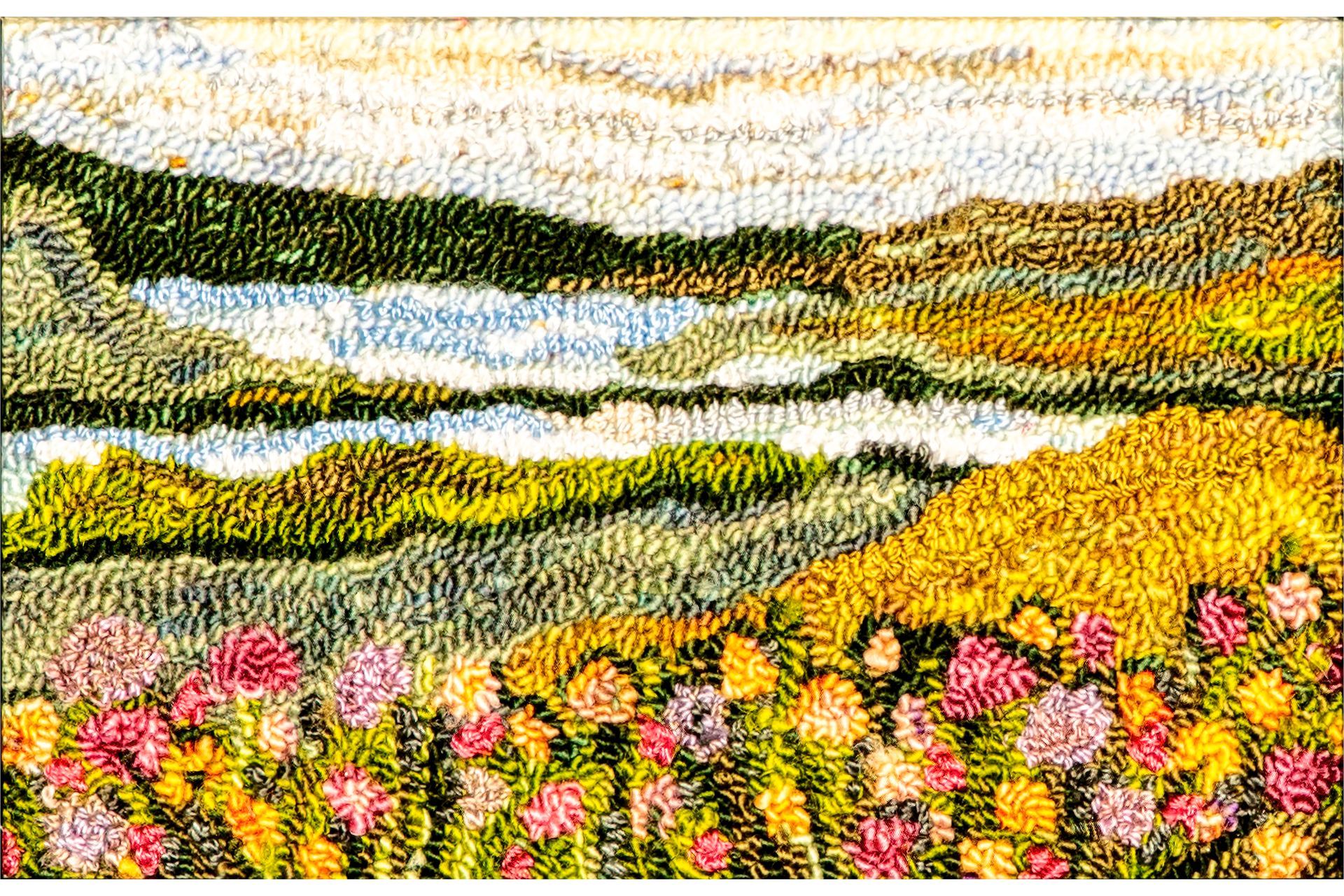 Colorful landscape painting with mountains, water, and flowers.
