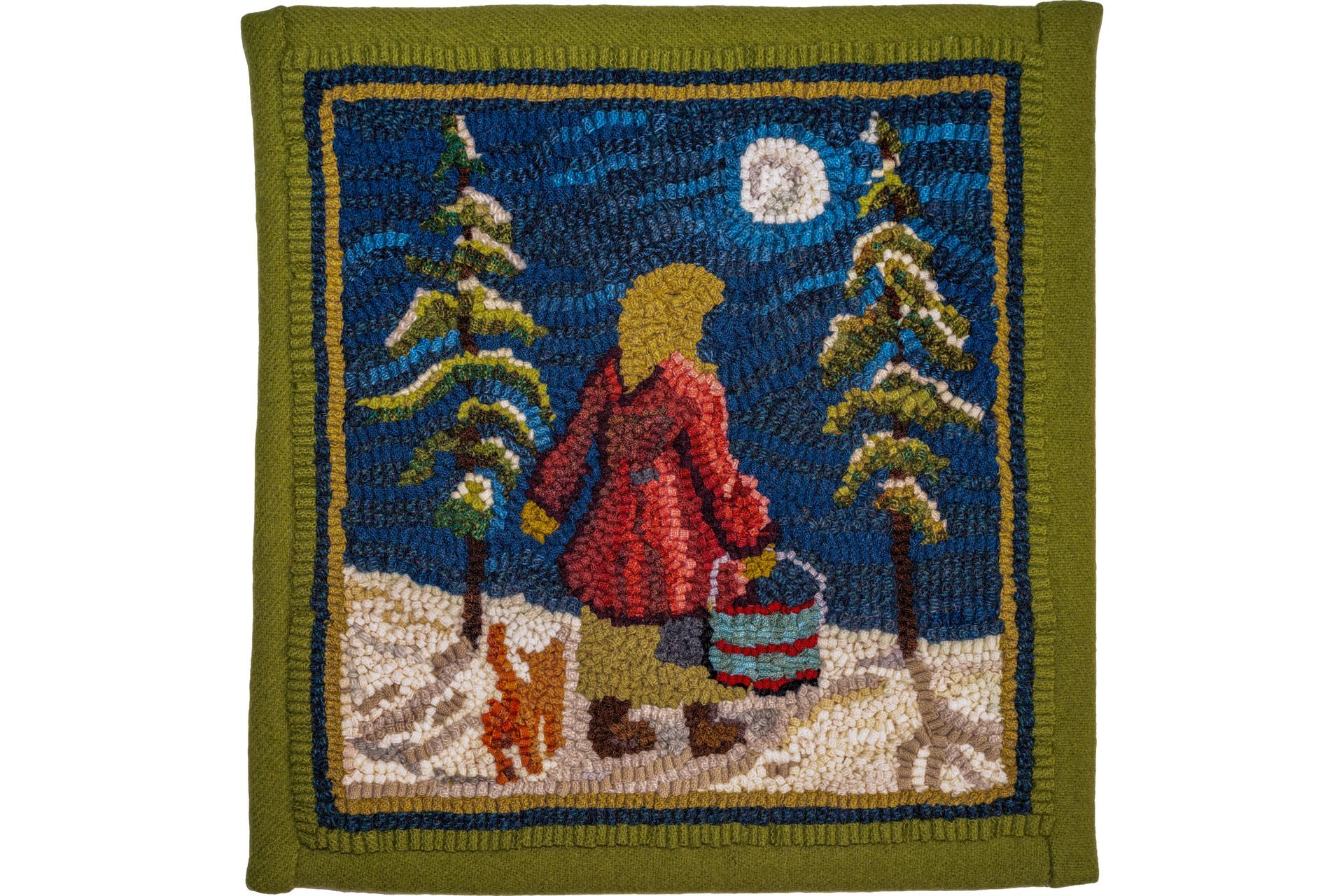 Rug depicts a person in a red coat carrying a bucket, walking in a snowy forest at night with a cat.