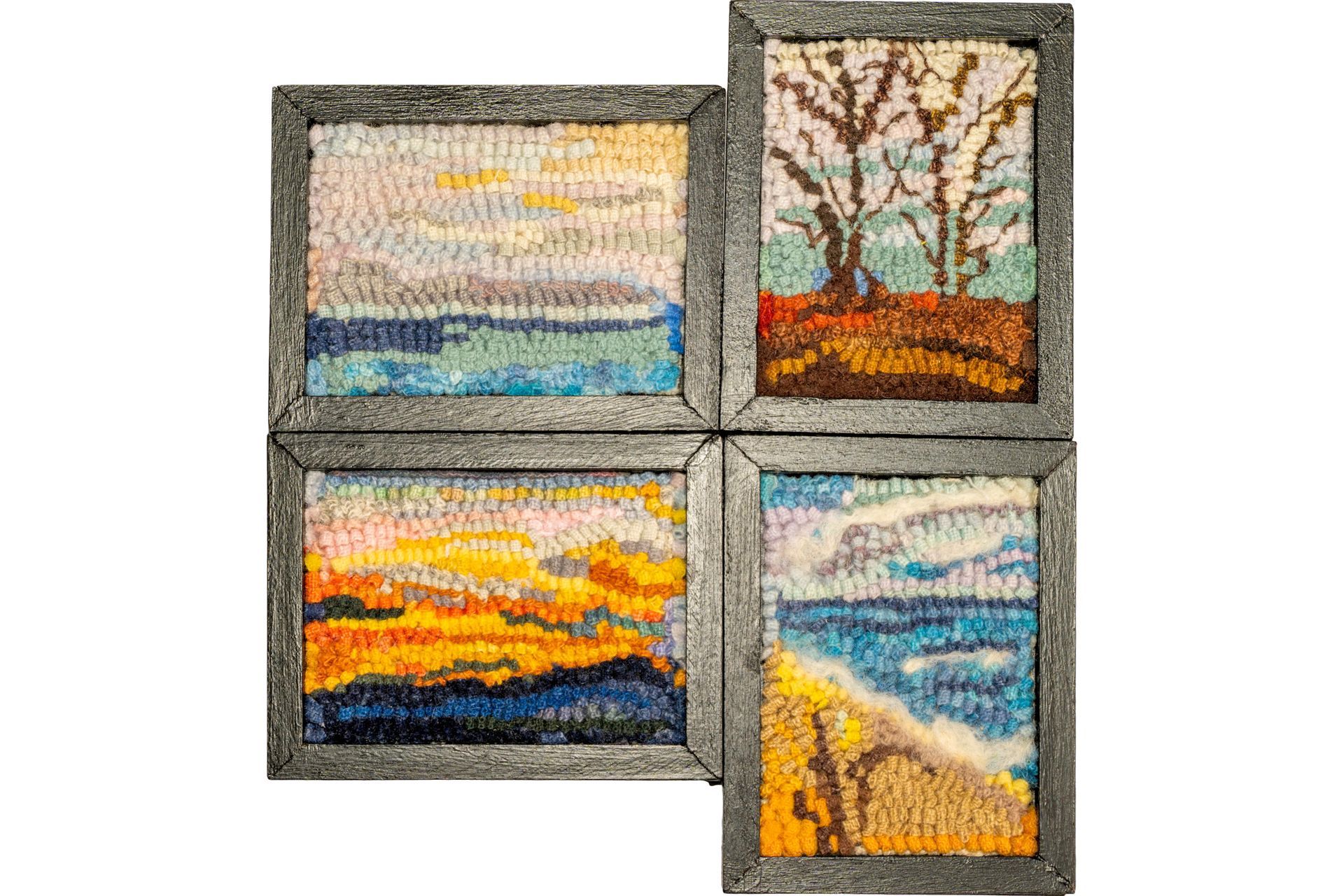 Four framed art panels depicting seascapes and a tree, crafted with textured materials in various colors.