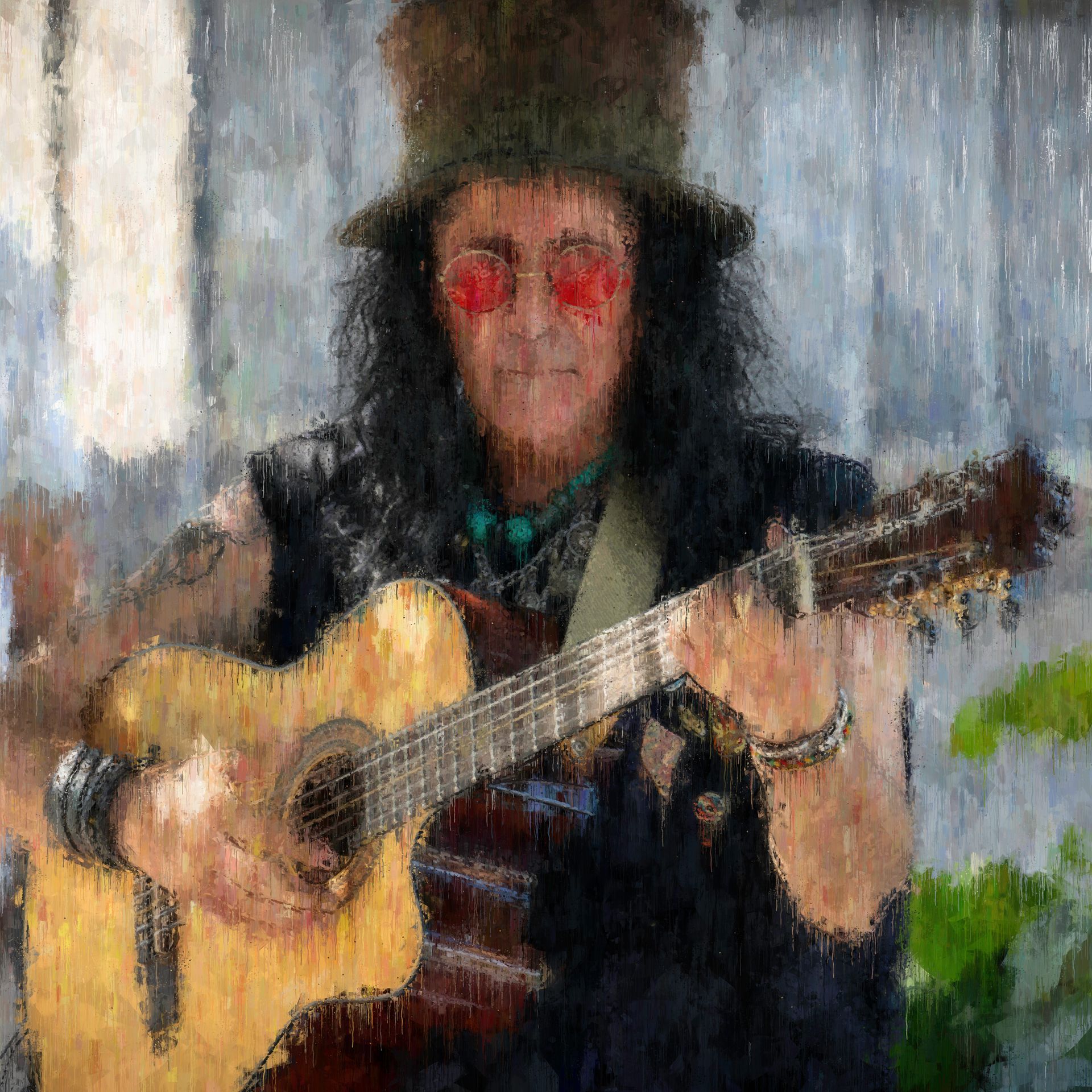 Man with long hair and a hat playing an acoustic guitar. He wears red-tinted glasses.
