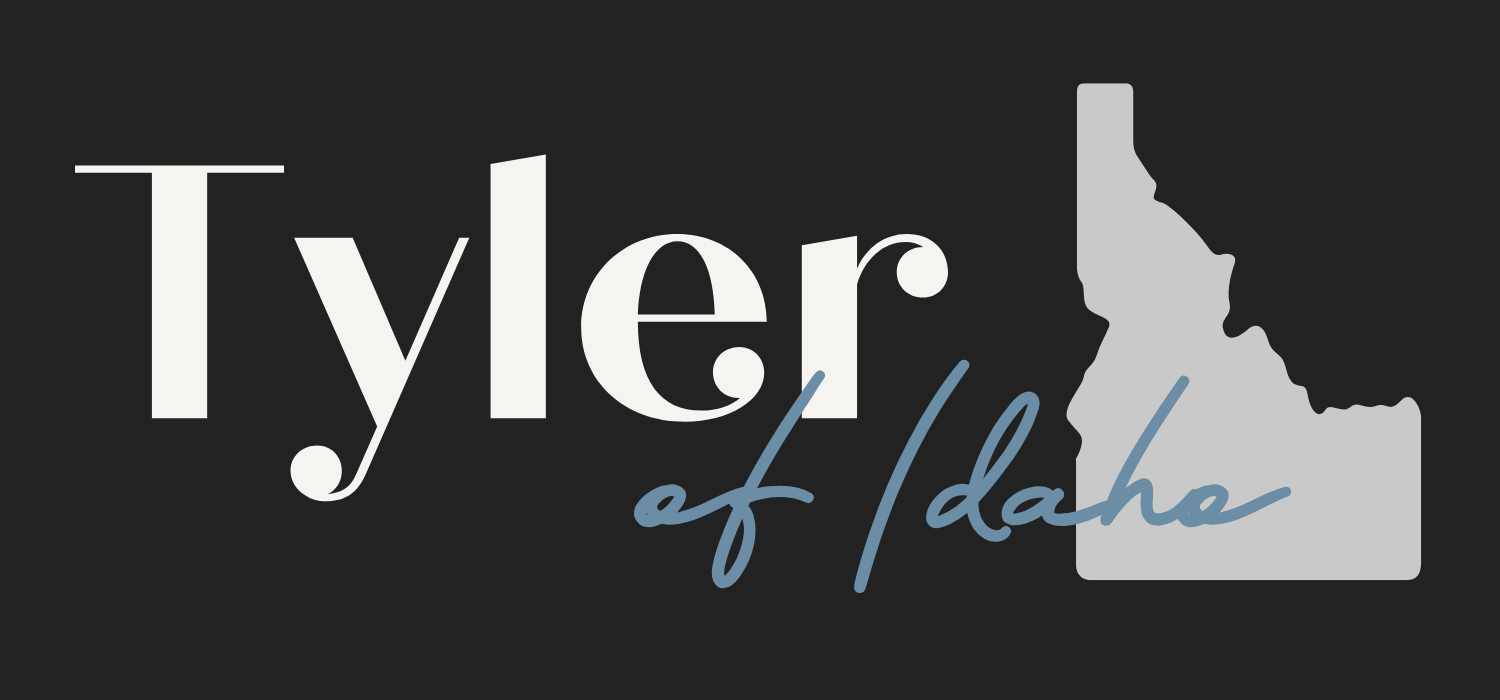 Tyler of Idaho logo on a dark background with the state of Idaho in light gray.