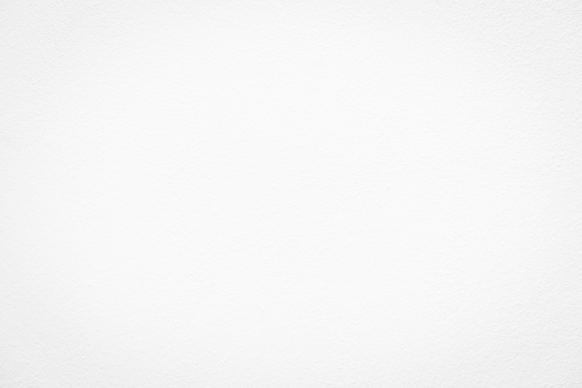 Fondo blanco texturizado liso con un ligero degradado gris.