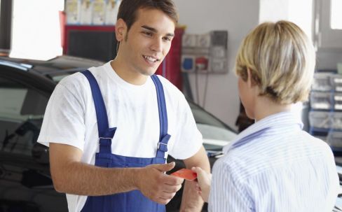 mechanic with customer