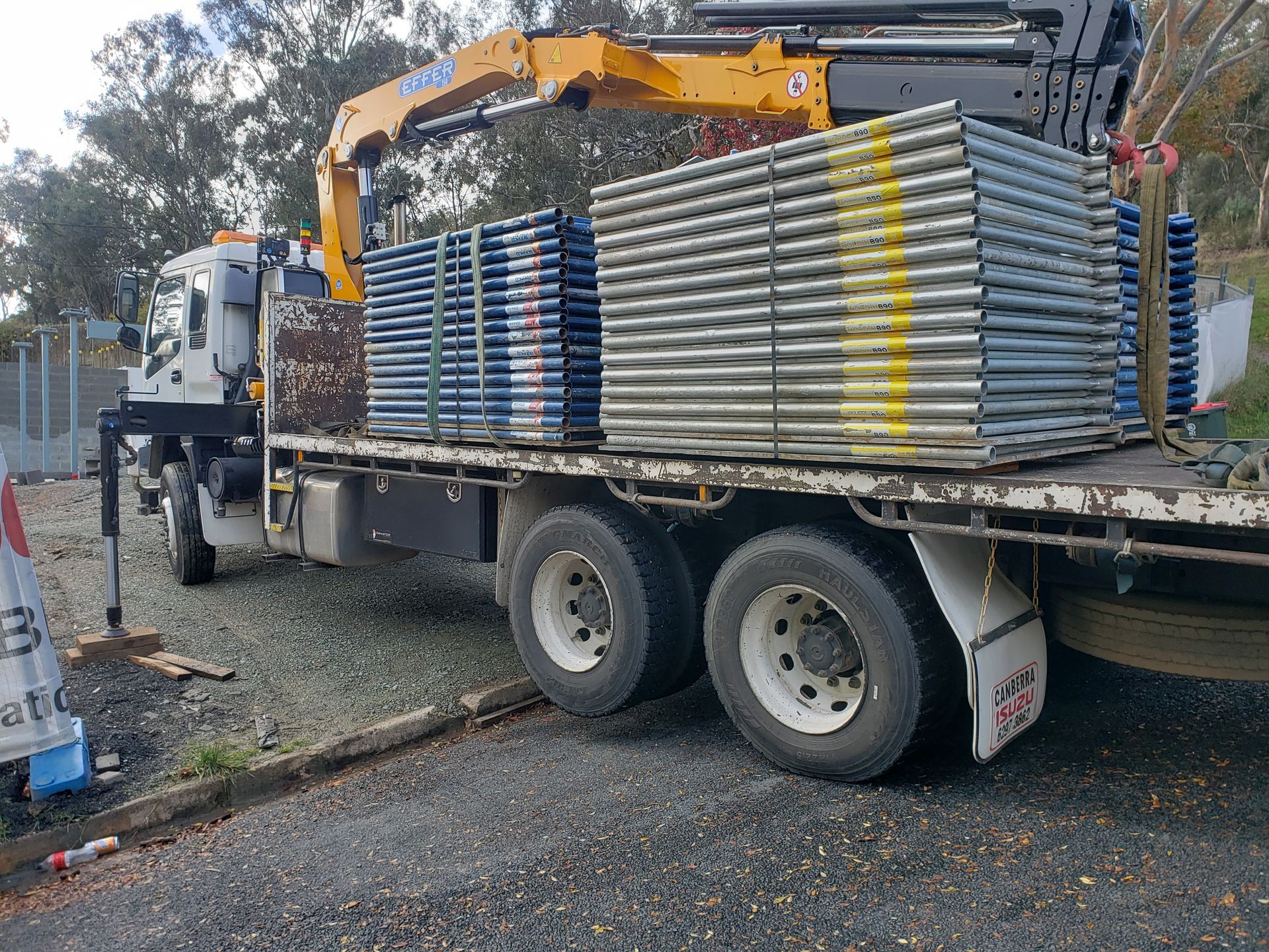 A Truck is Loaded With Scaffolding and a Crane — Alexander Crane Tippers in Latham, ACT