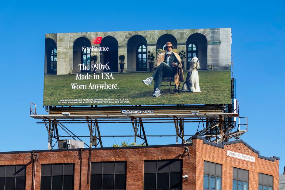 A billboard on top of a brick building that says made in usa