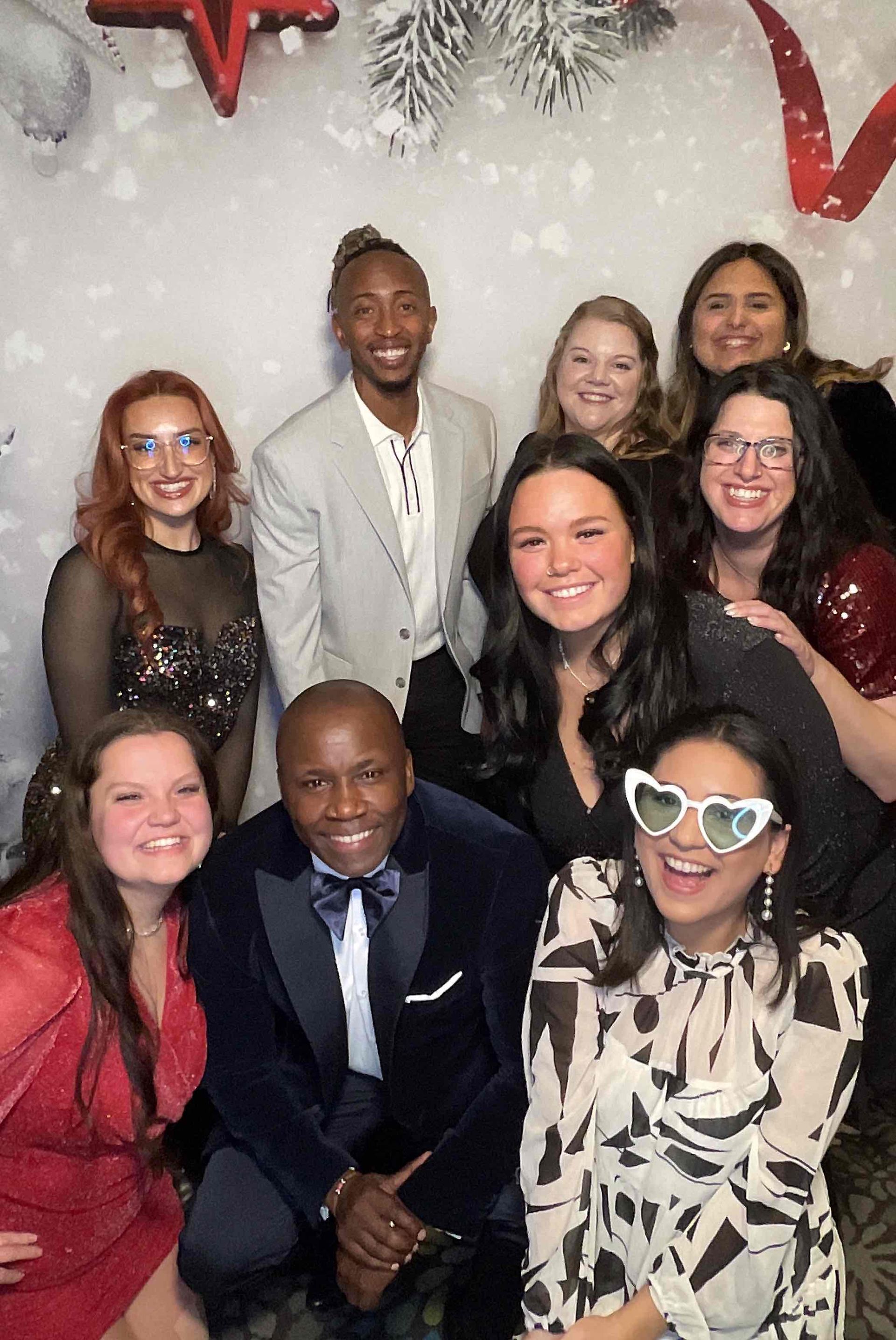 A group of people are posing for a picture together.