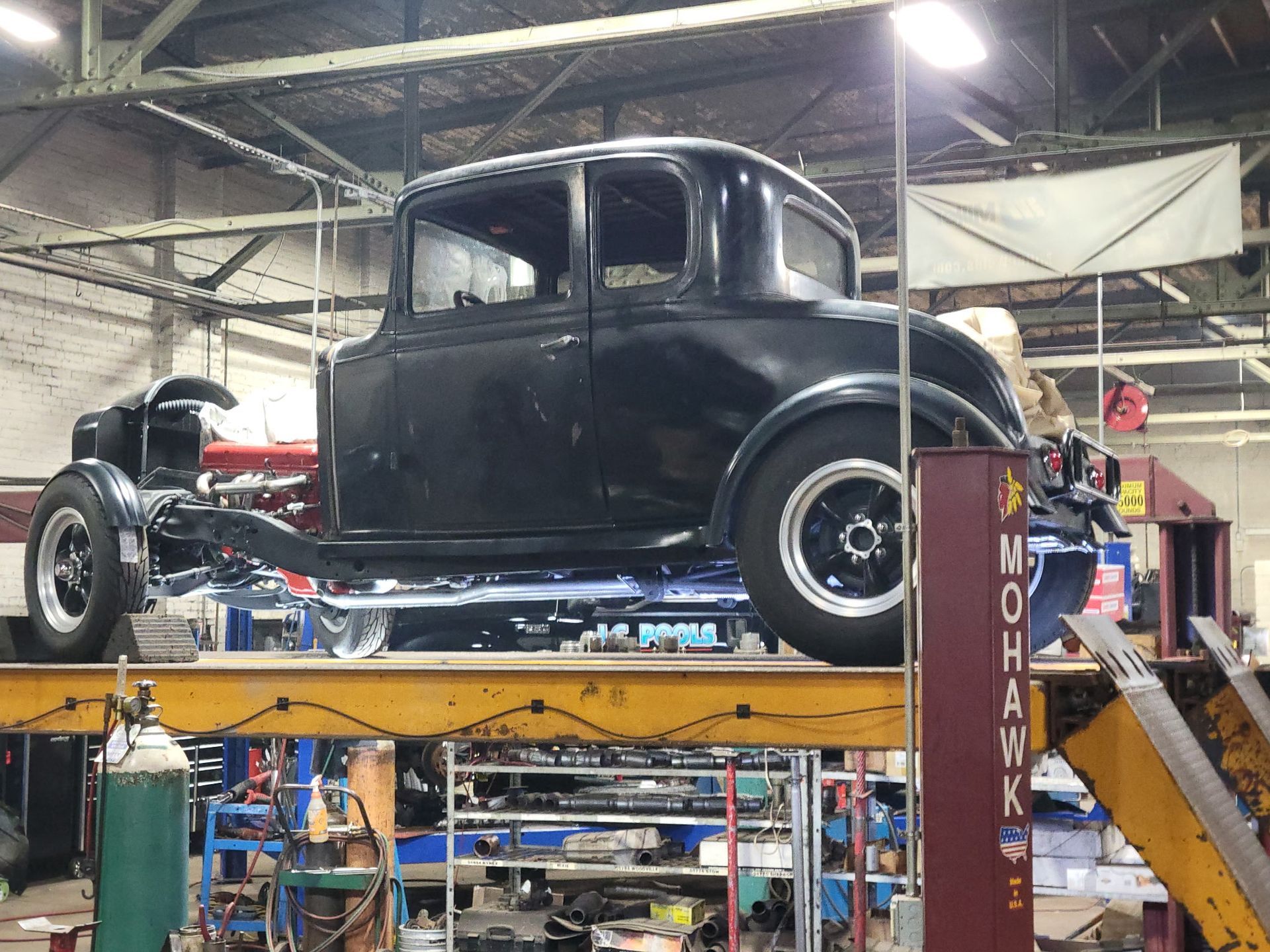 Red vintage hot rod exhaust service at Lou’s Custom Exhaust in Worcester, MA