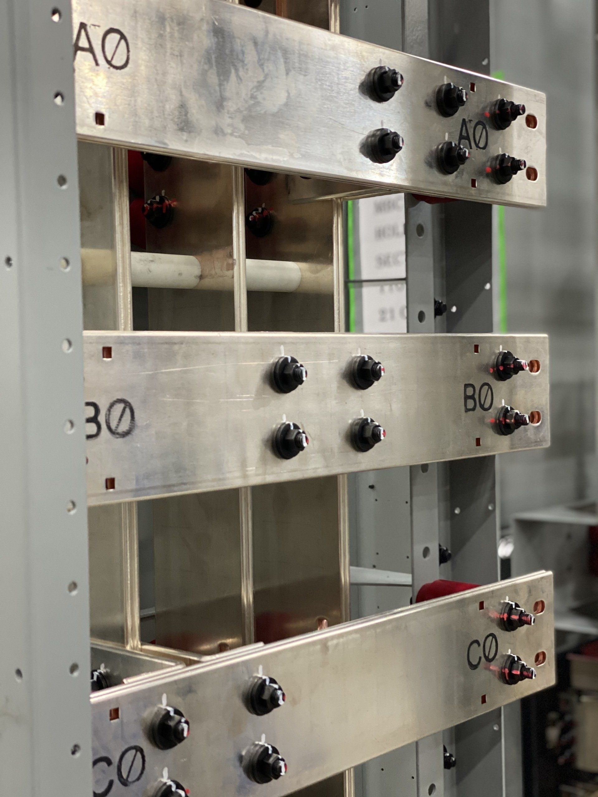 A row of metal plates with the numbers 30 and 30 on them