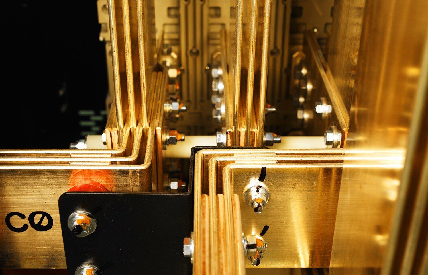 A close up of a bunch of copper wires connected to each other.