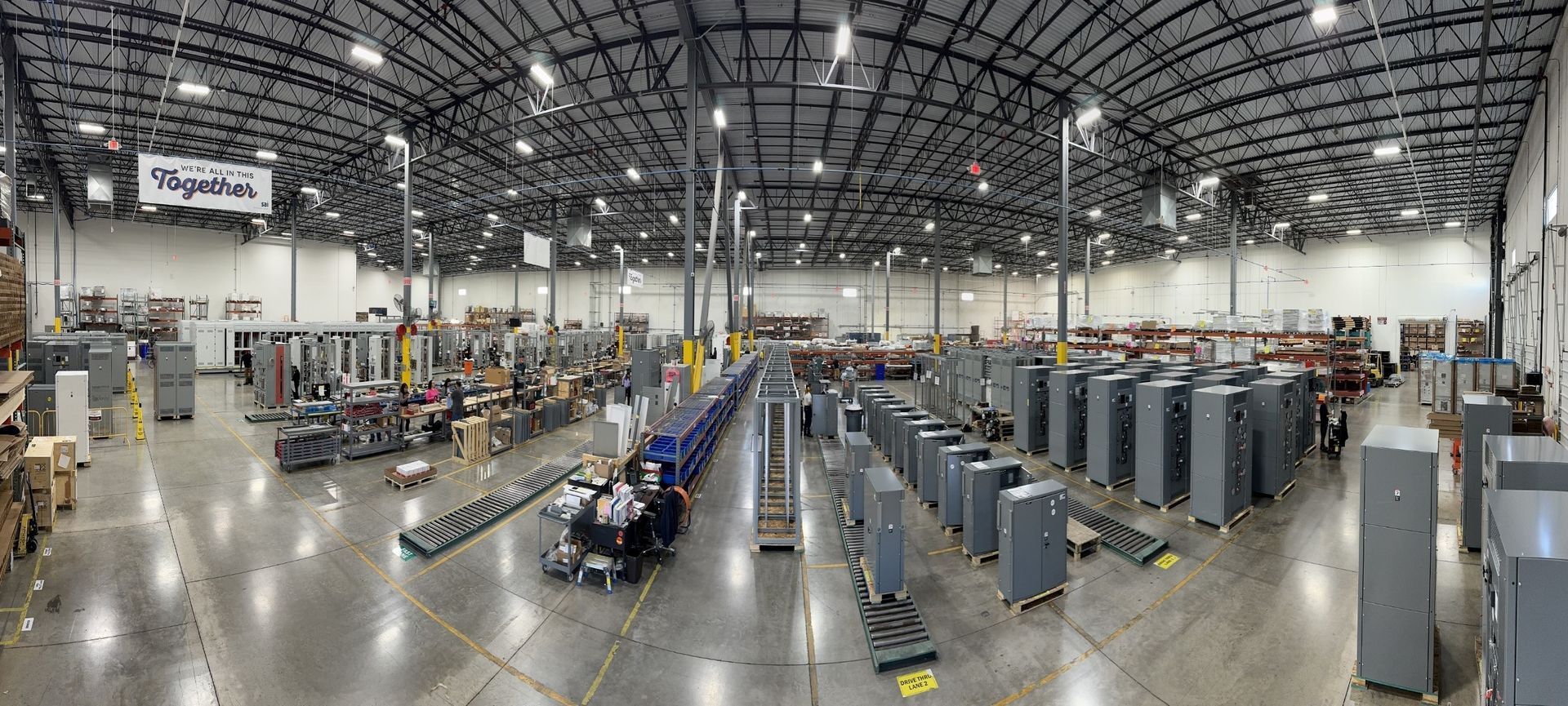 A large warehouse filled with lots of electrical equipment.