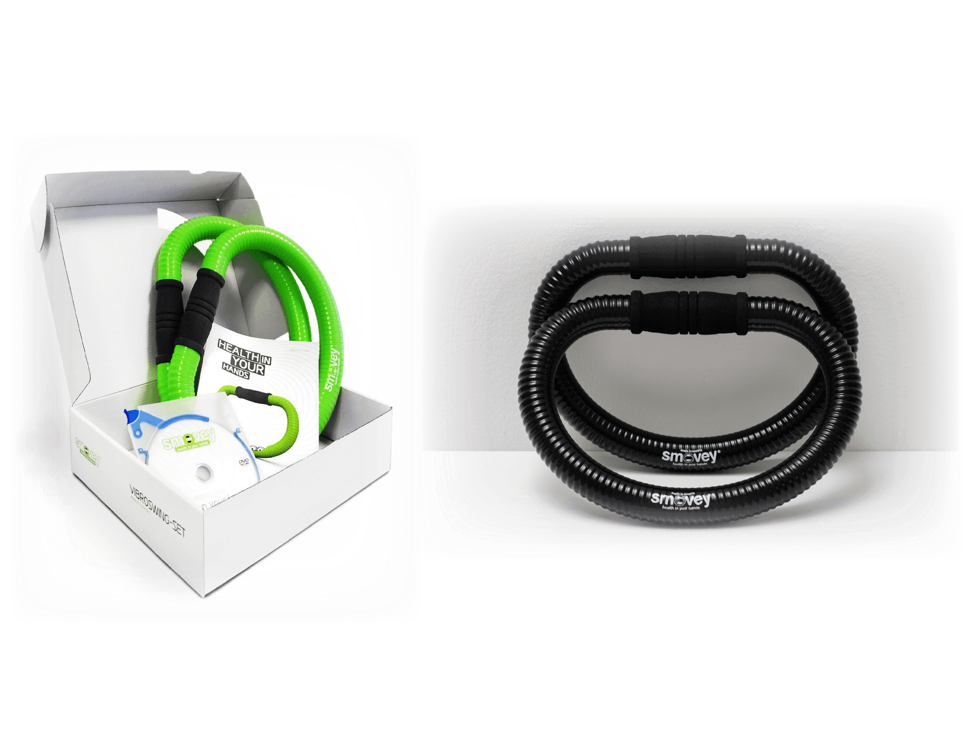 A green and black hose is sitting next to a black hose in a box.