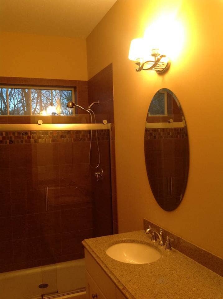 New bathroom interior with mirror — Construction Company in Bloomington, IN