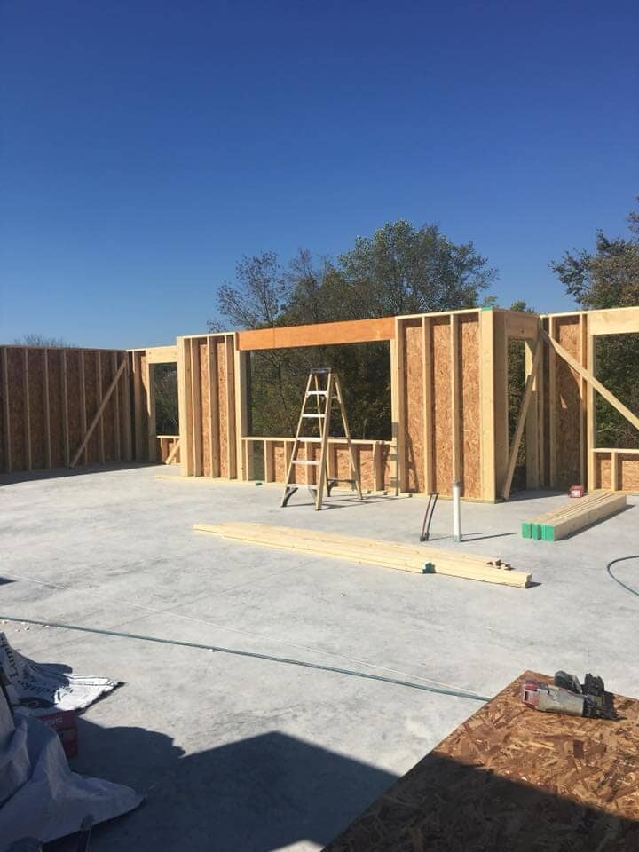 New concrete and wood frame of house — Construction Company in Bloomington, IN