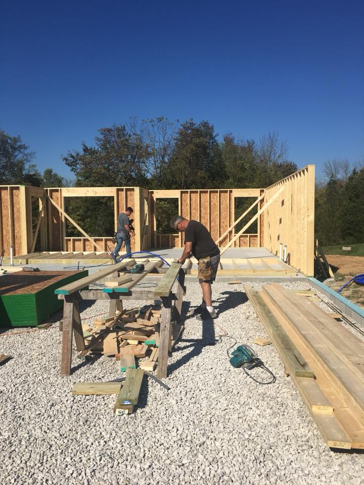 Carpenter working on house wood frame  — Construction Company in Bloomington, IN