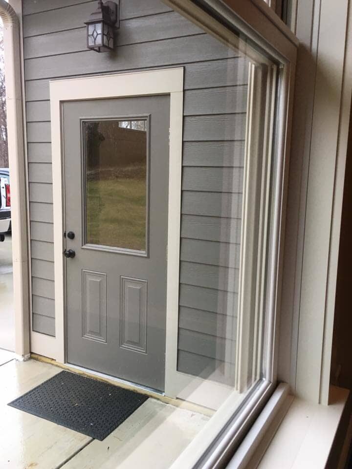 New paint wood door — Construction Company in Bloomington, IN