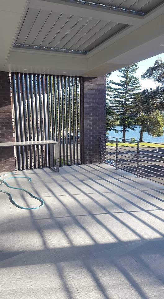 Empty balcony with a hose on the floor — Balustrade in Shellharbour NSW