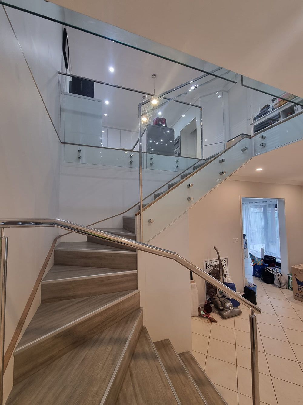 Staircase with a glass railing — Pool Fence in Unanderra NSW
