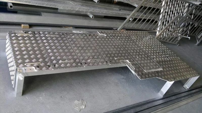 Stainless steel table with a checkered pattern — Balustrading in Unanderra NSW