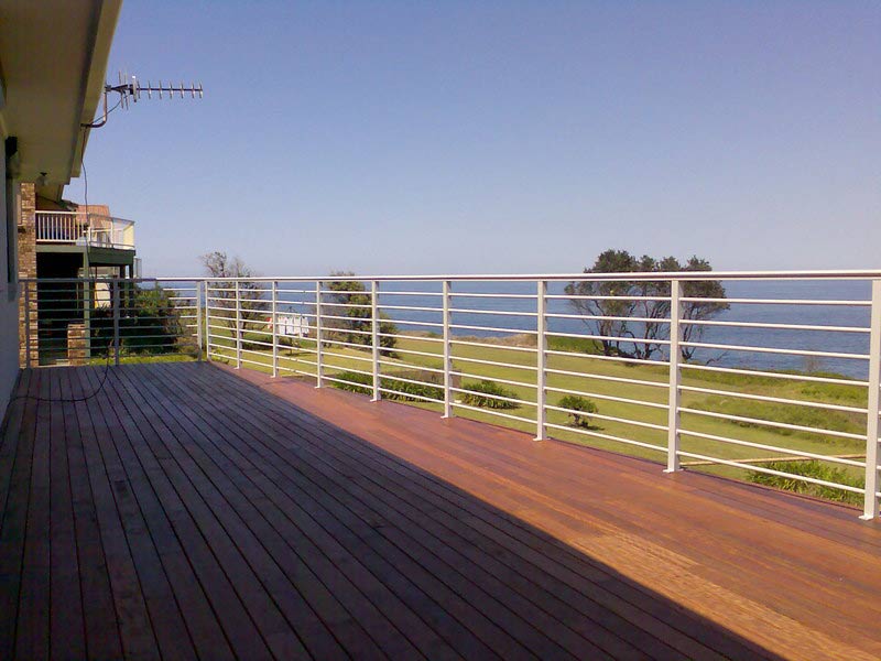 Balcony with a metal railing with green field — Balustrading in Unanderra NSW