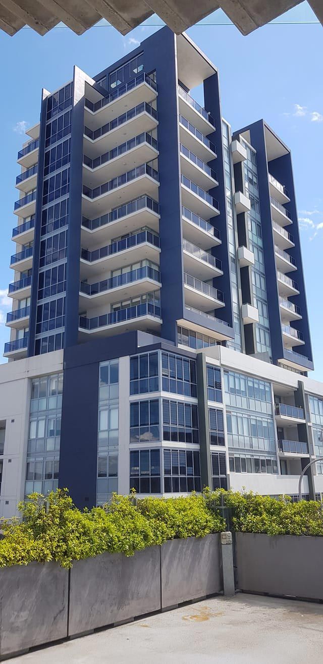 Building with a lot of windows and balconies — Balustrade in Kiama NSW
