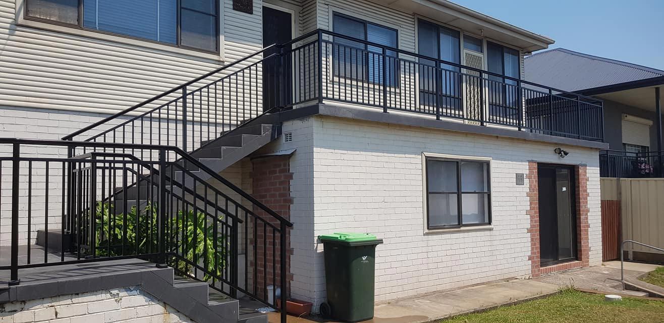 White house with black metal railings — Balustrade in Kiama NSW
