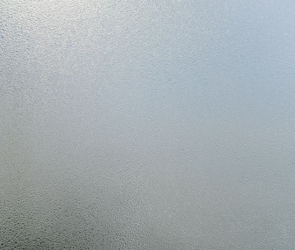 A Close Up of a Frosted Glass Window — TSR Tinting & Frosting In Caloundra West, QLD