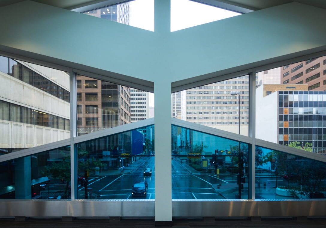 A View of a City Through a Cross Shaped Window — TSR Tinting & Frosting in Caloundra, QLD