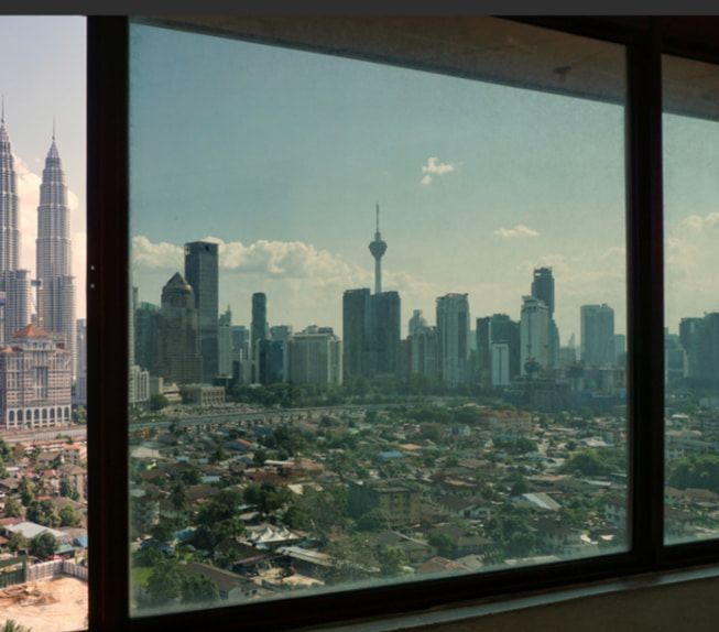 A View of a City Skyline Through a Window — TSR Tinting & Frosting in Maroochydore, QLD